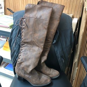 Above the knee lace up boots